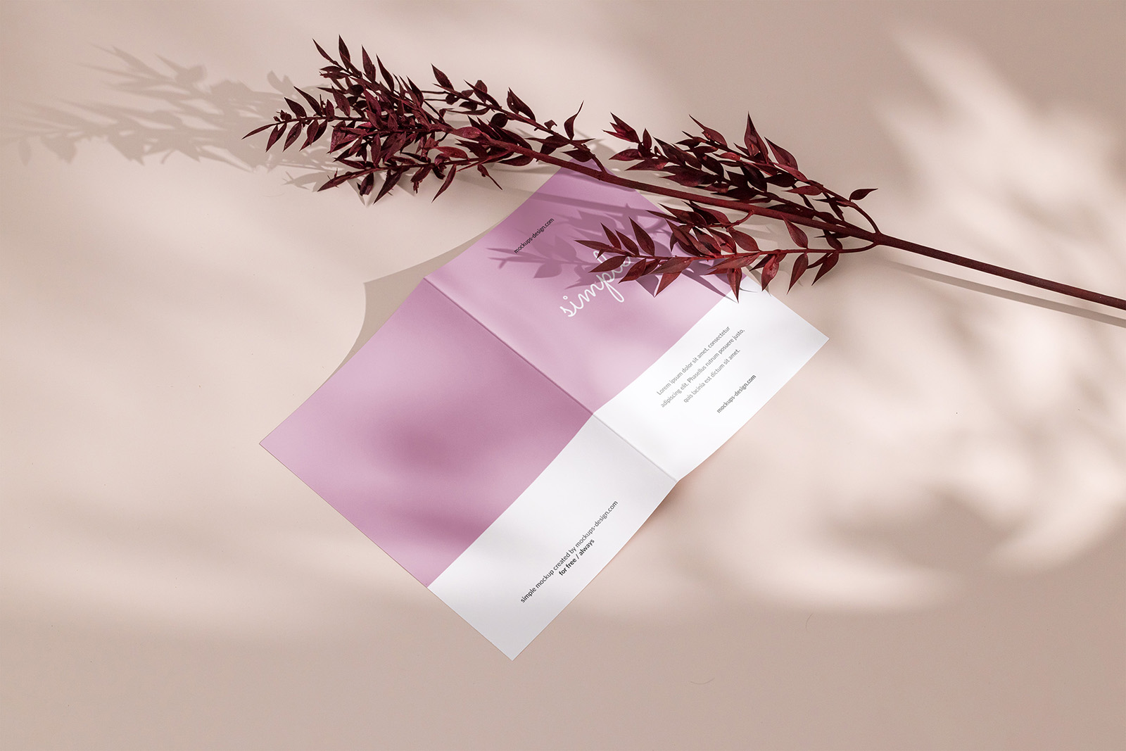 Bi fold flyer with dried leafs mockup