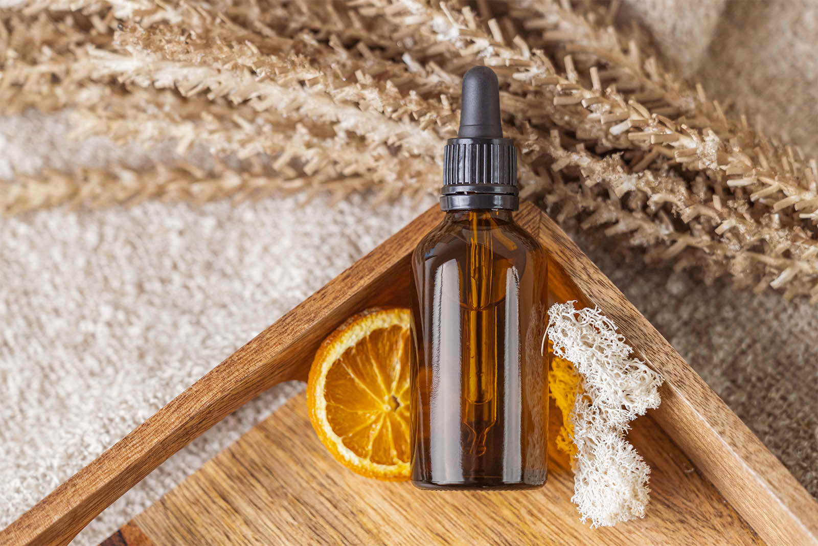 Dropper bottle on natural background mockup