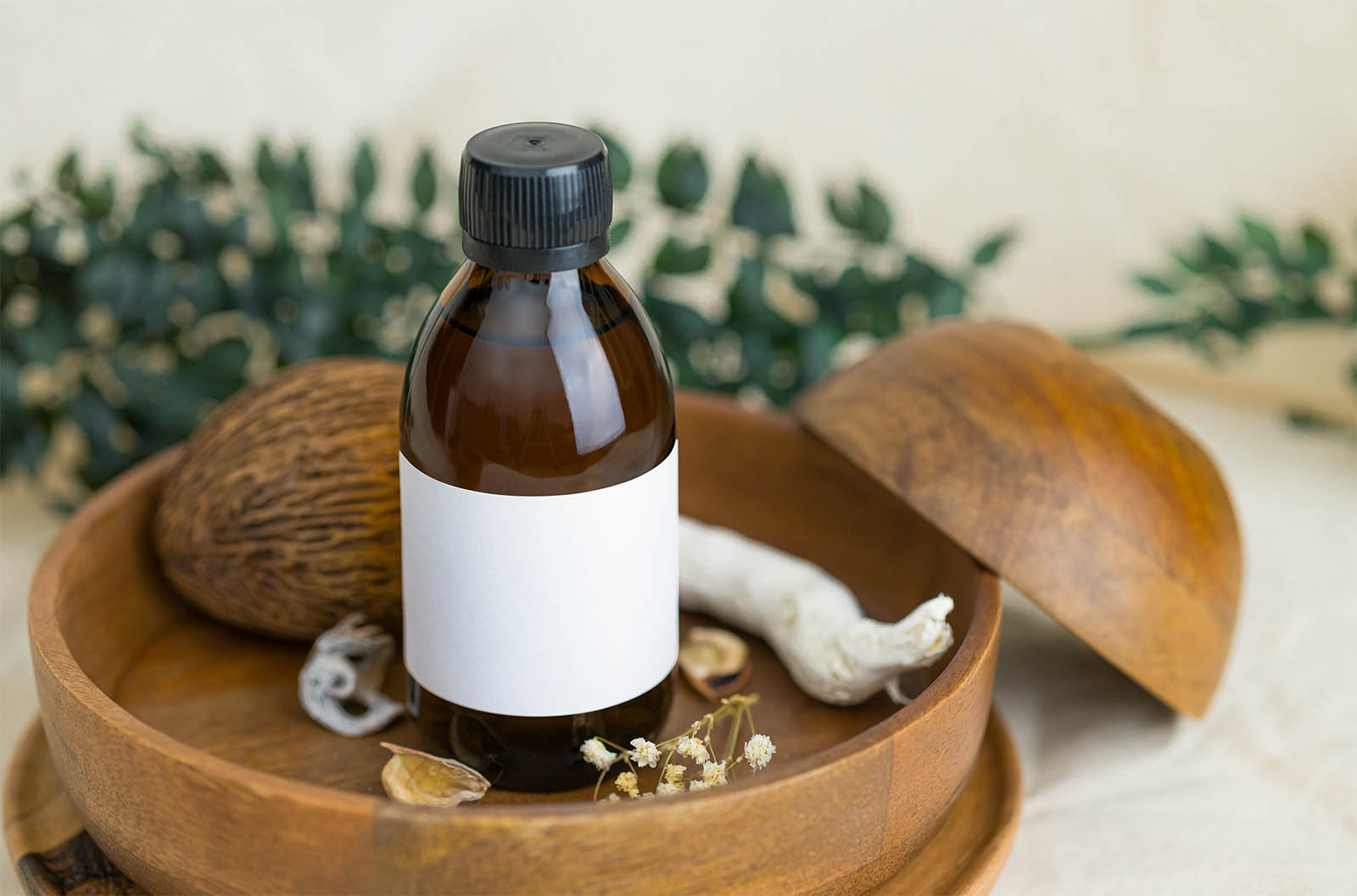 Sirup bottle on wooden tray mockup