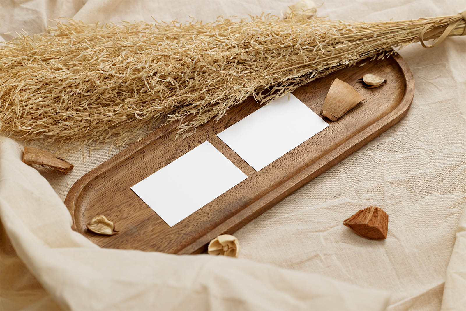 Two business cards in wooden tray mockup