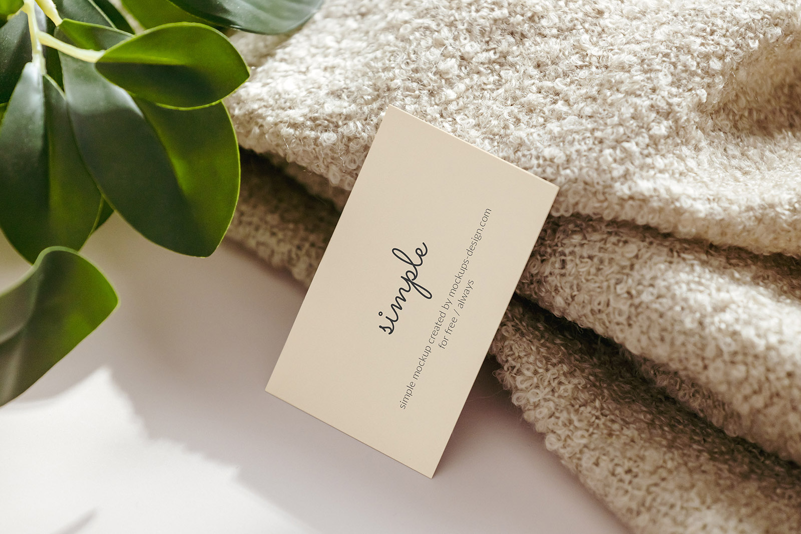 Business card with a towel mockup