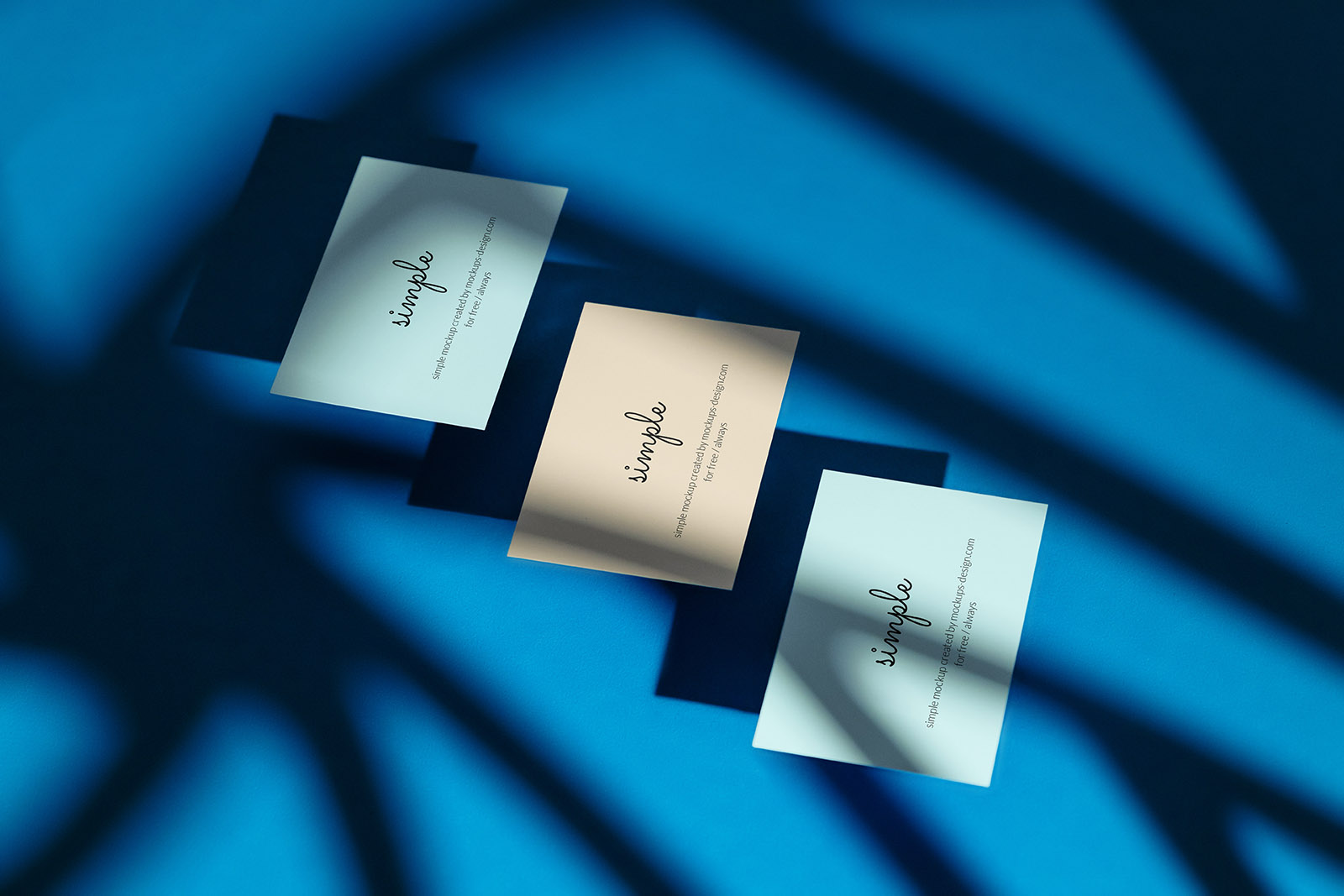 Three business cards with shadow mockup
