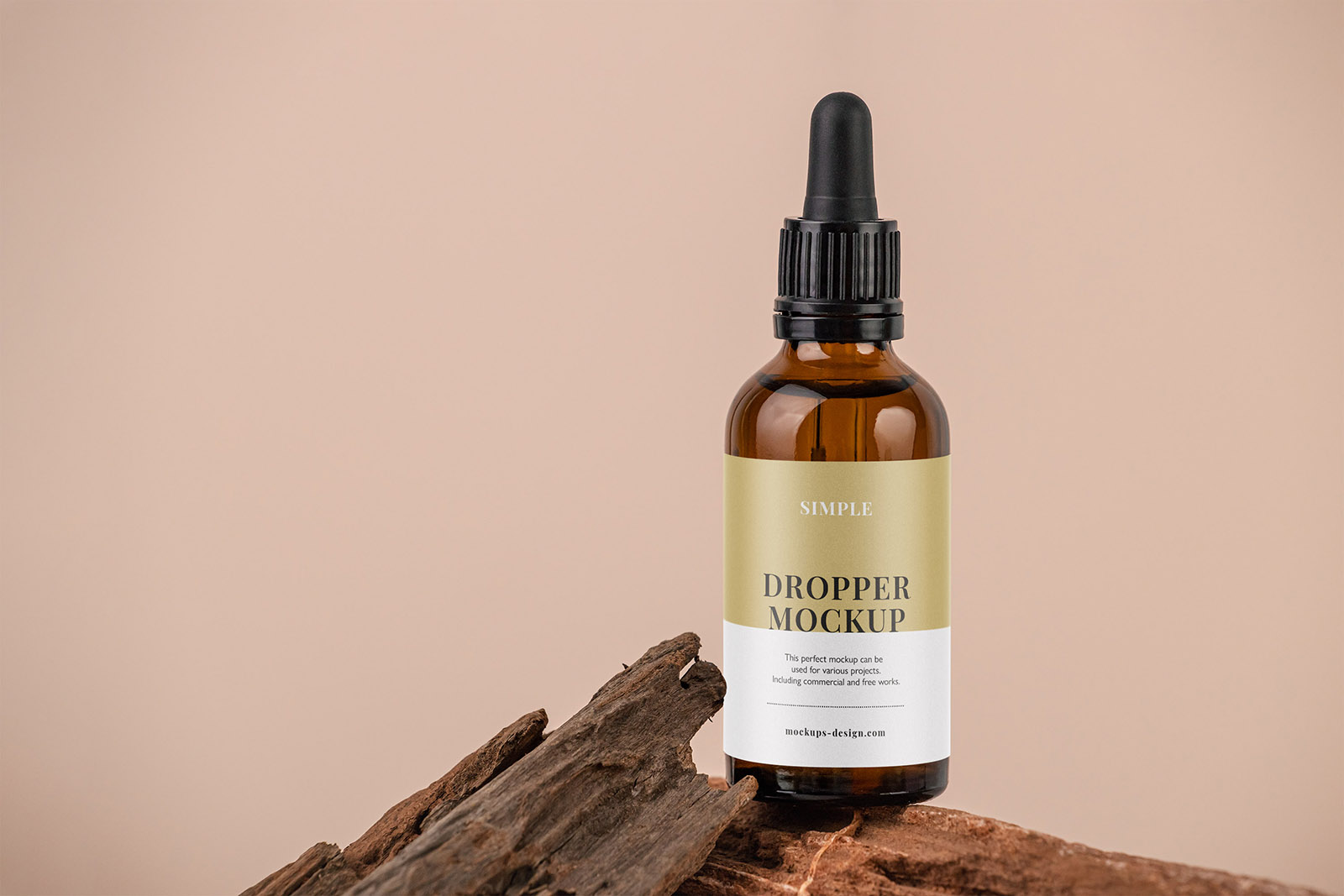 Amber dropper bottle on the rocks