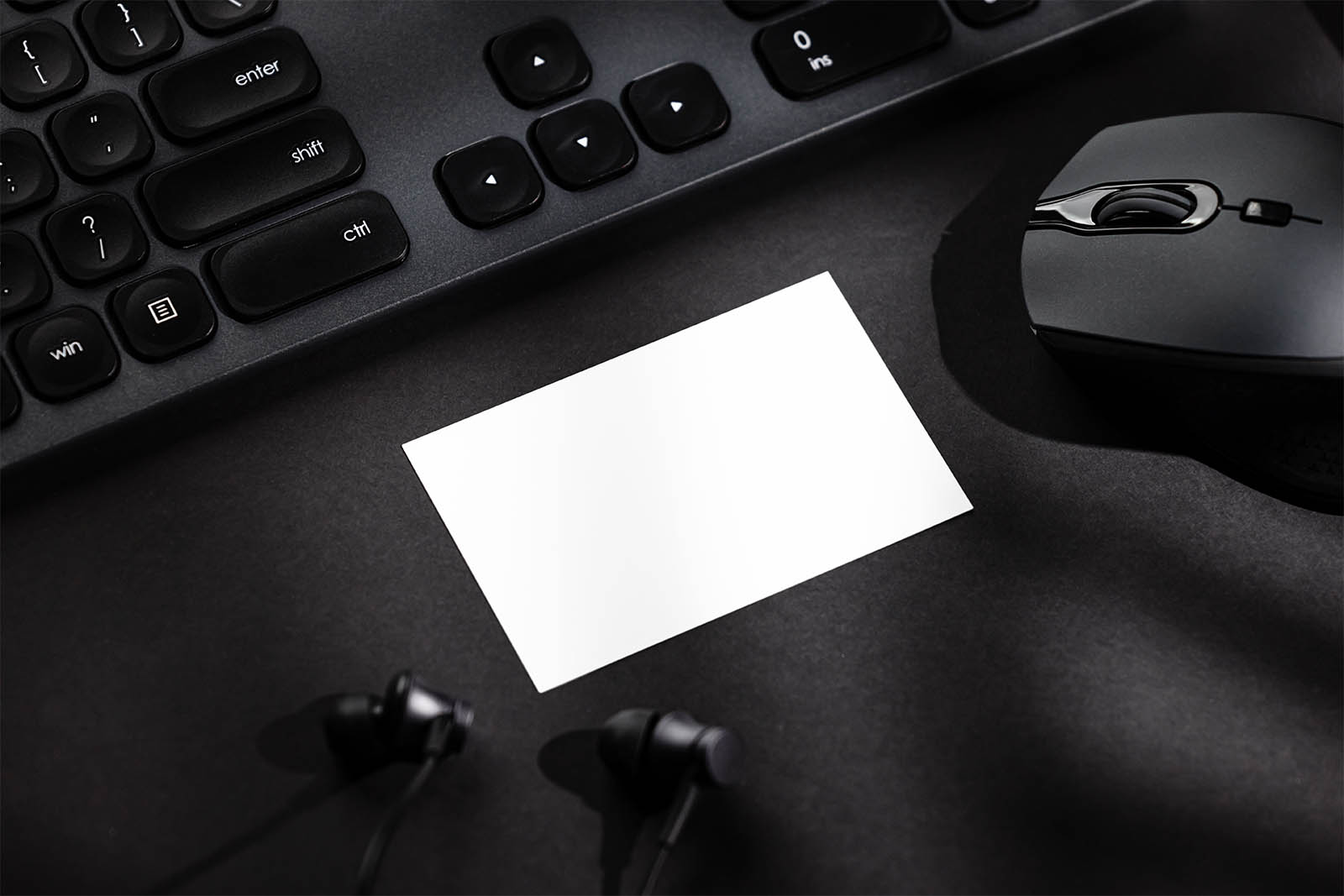 Black business card on black background mockup