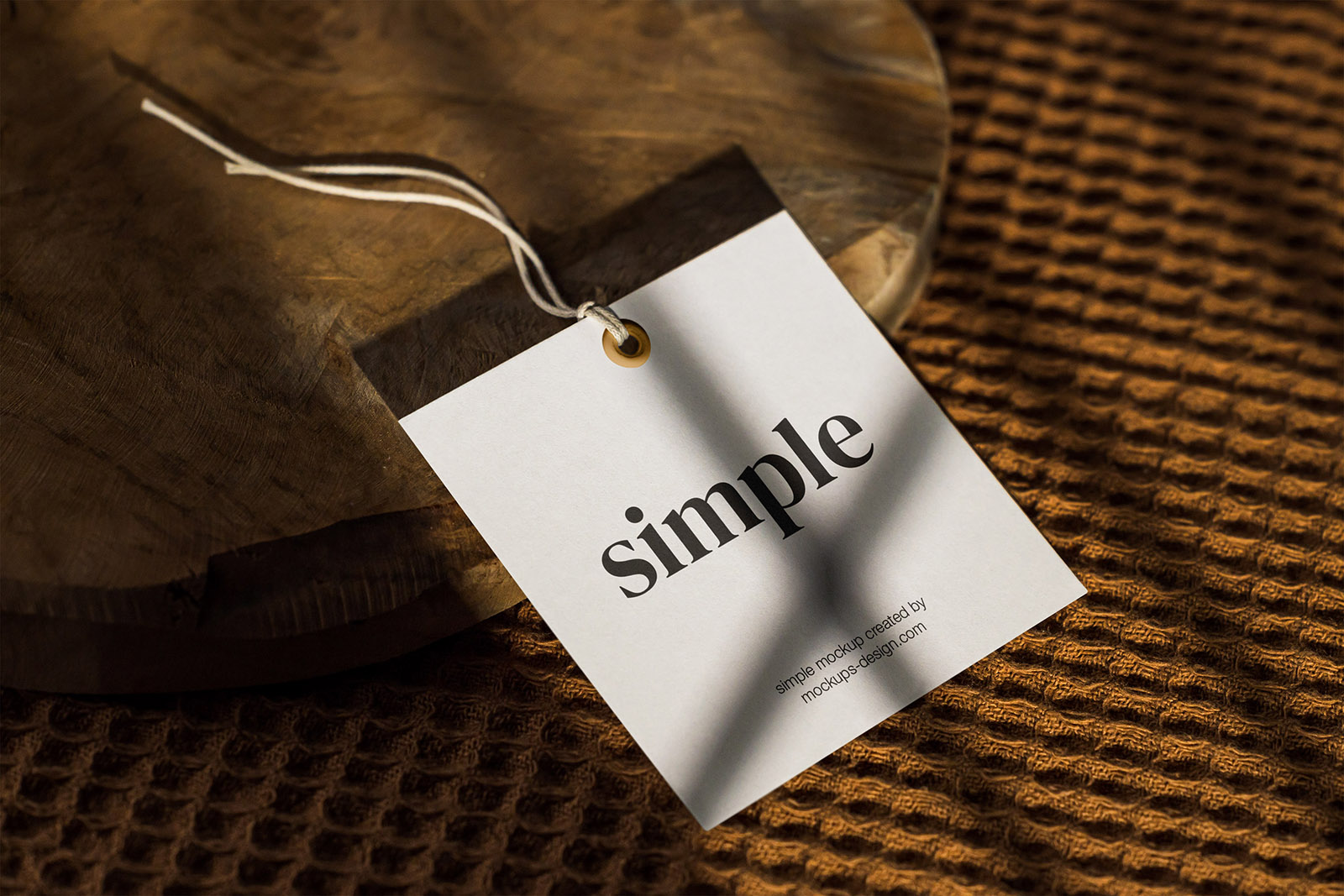Square label tag on sliced wood mockup