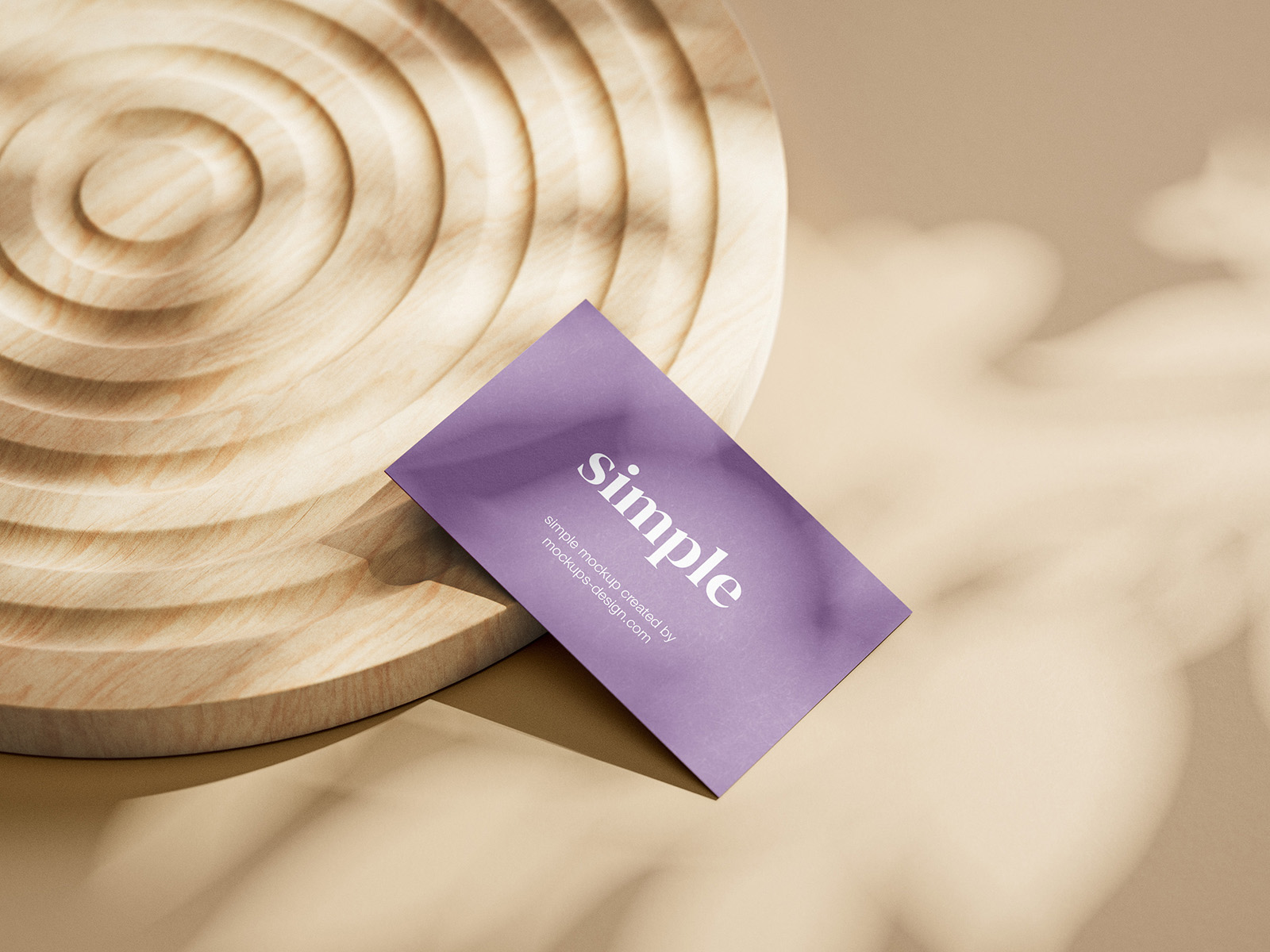 Business cards mockup on wooden ornament