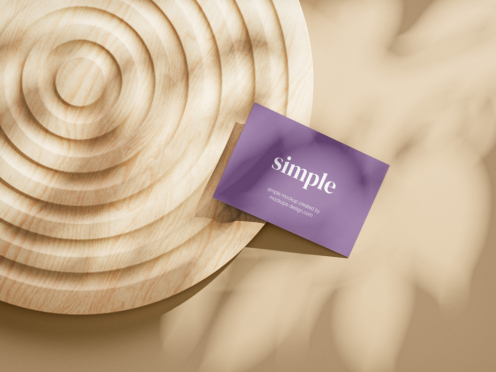 Business cards mockup on wooden ornament