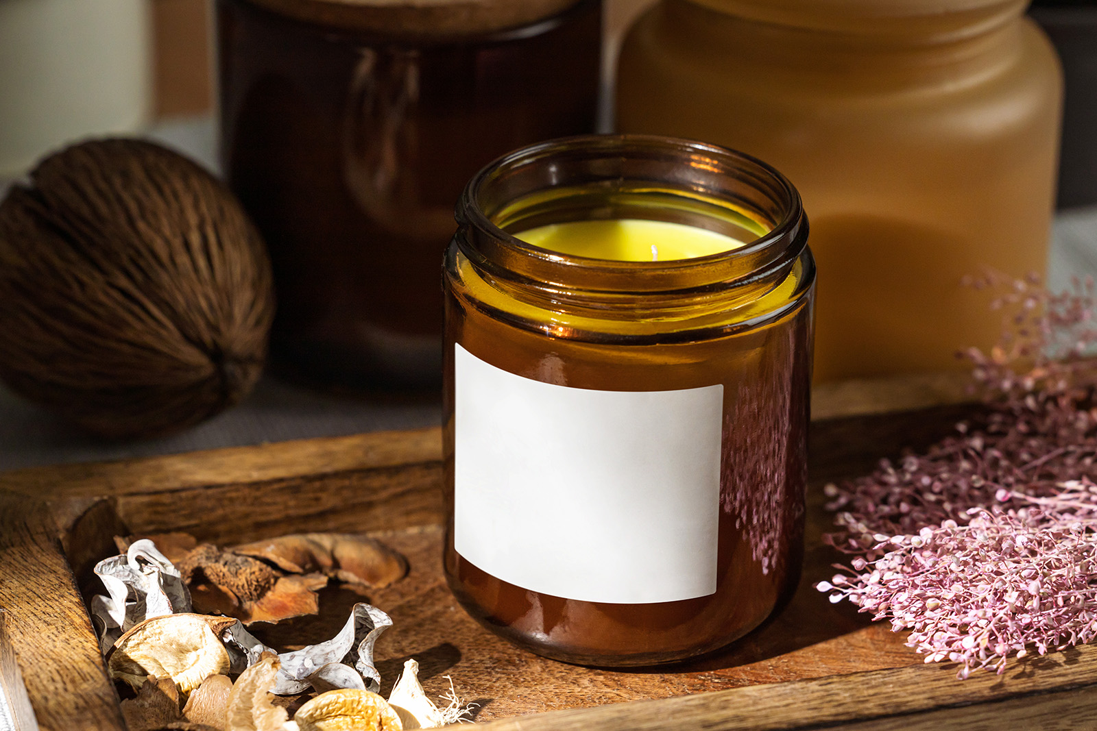 Candle in amber jar mockup