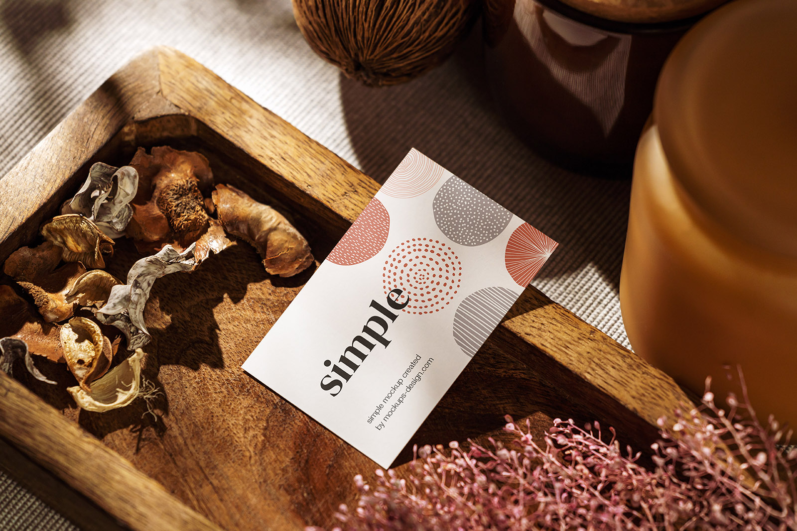Business card on wooden tray PSD