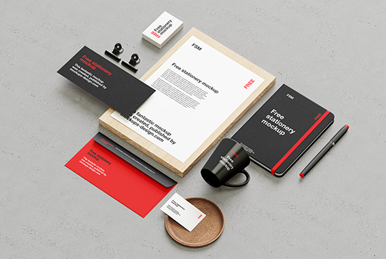 Stationery on concrete background mockup