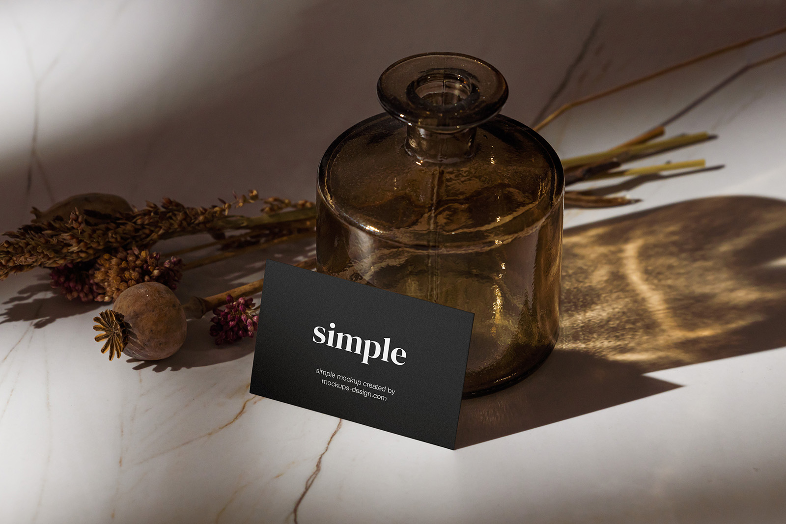 Business card with marble and bottle mockup