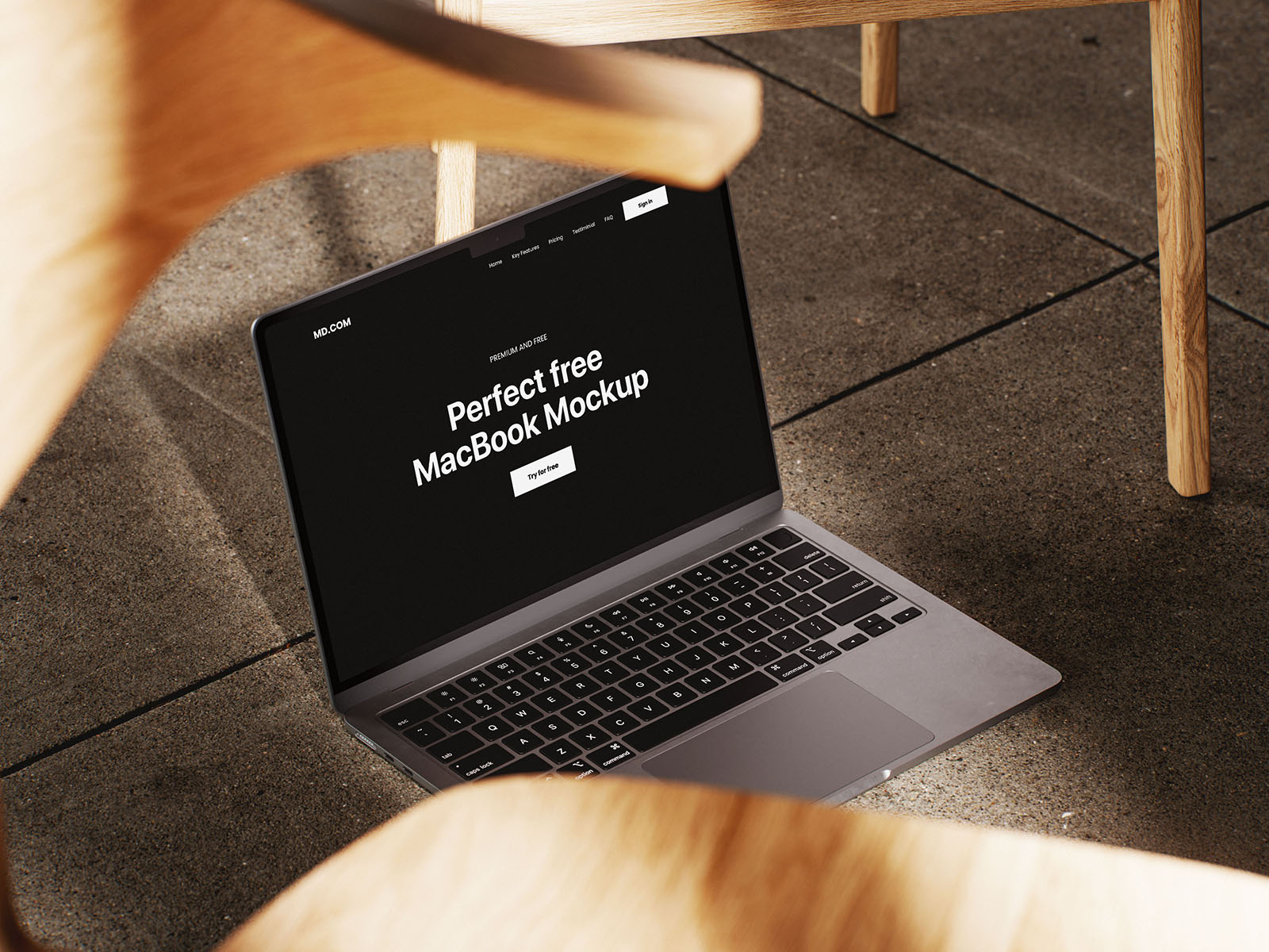 MacBook mockup on wooden chair